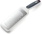 Sharp cutting edge grates precisely without tearing or ripping food. Smooth Glide Course Grater